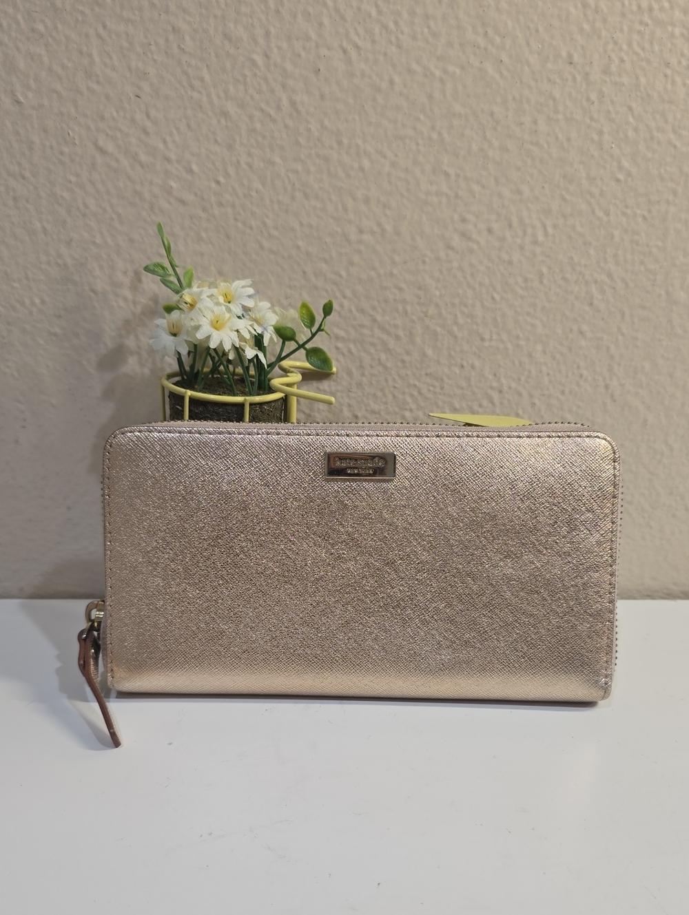 kate spade metallic rose gold zip-around continental wallet